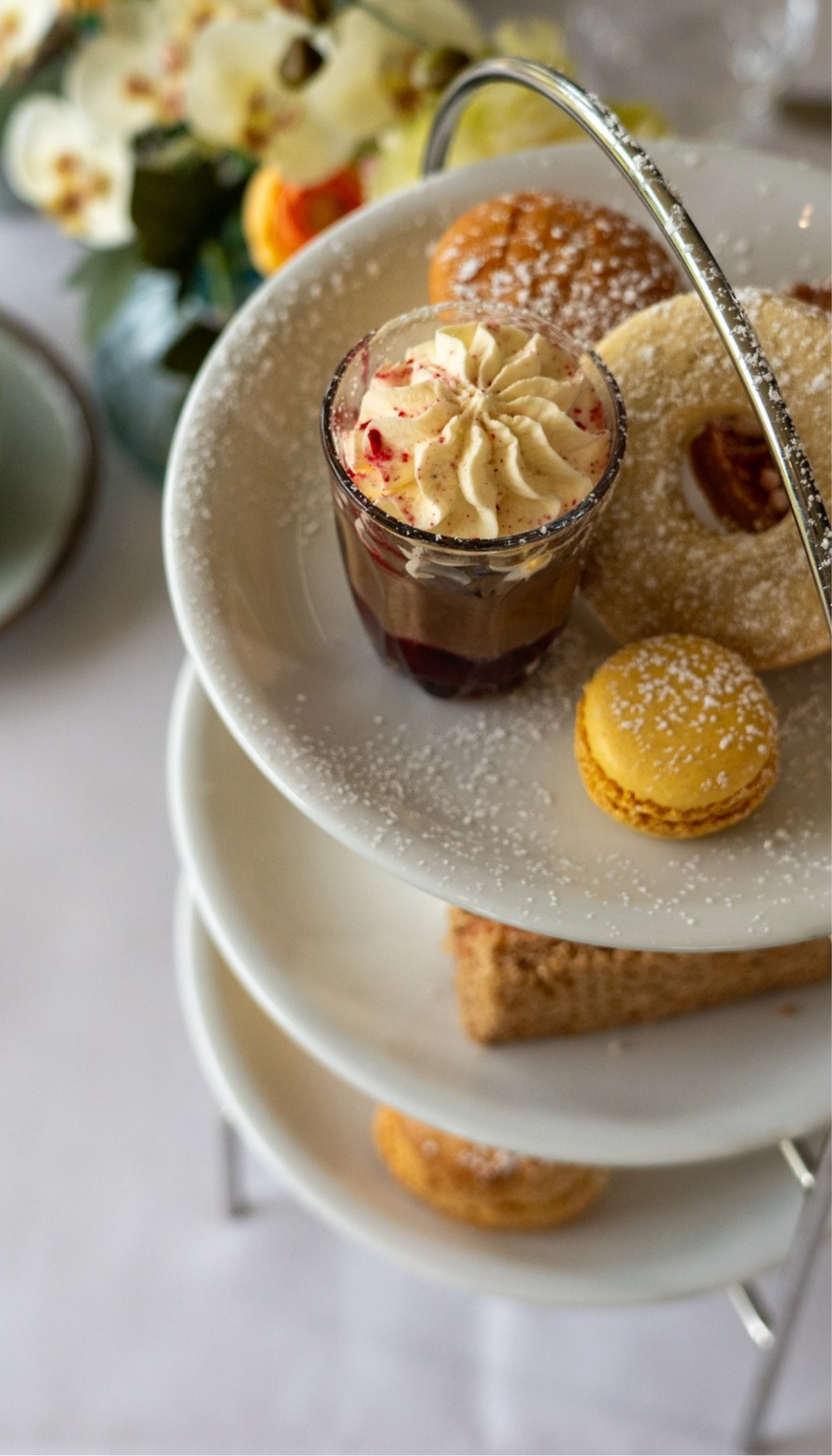 A close-up of the cakes and pastries served with Farleigh afternoon tea